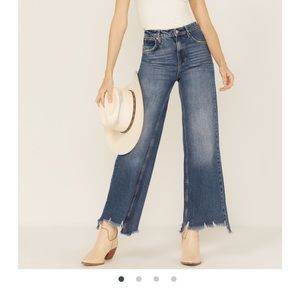 We the free by Freepeople size 28 raw hem ankle wideleg/flare jeans